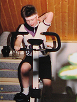 Christian Helm as a child on the exercise bike