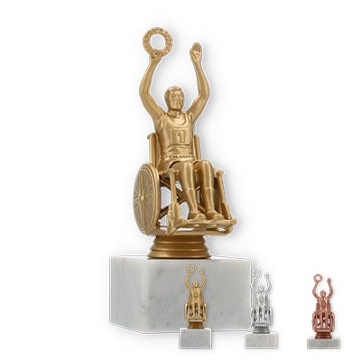 Trophy plastic figure wheelchair user on white marble base