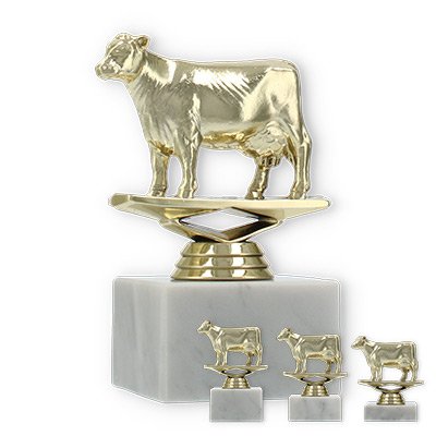 Troféu figura de plástico de ouro de vaca sobre base de mármore branco